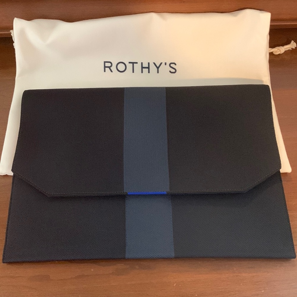 Rothy’s Dark Graphite portfolio. Brand new in box. Dust bag included.